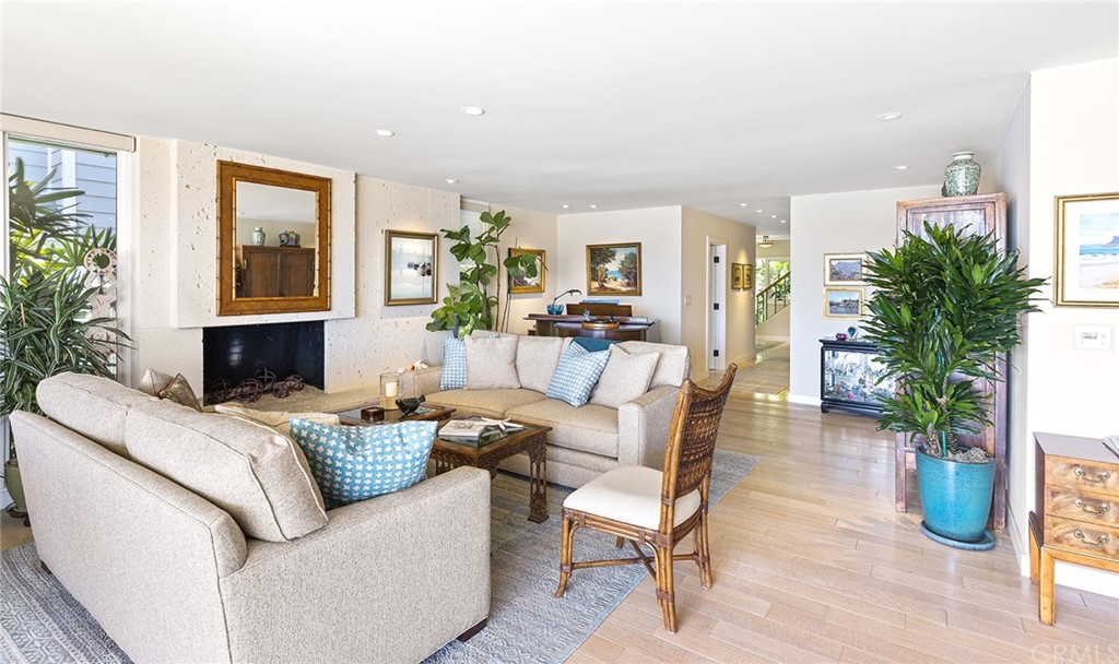 7 Beacon Bay Newport Beach, CA 92660 - Photo 18 of 59 a living room with furniture potted plant and a window