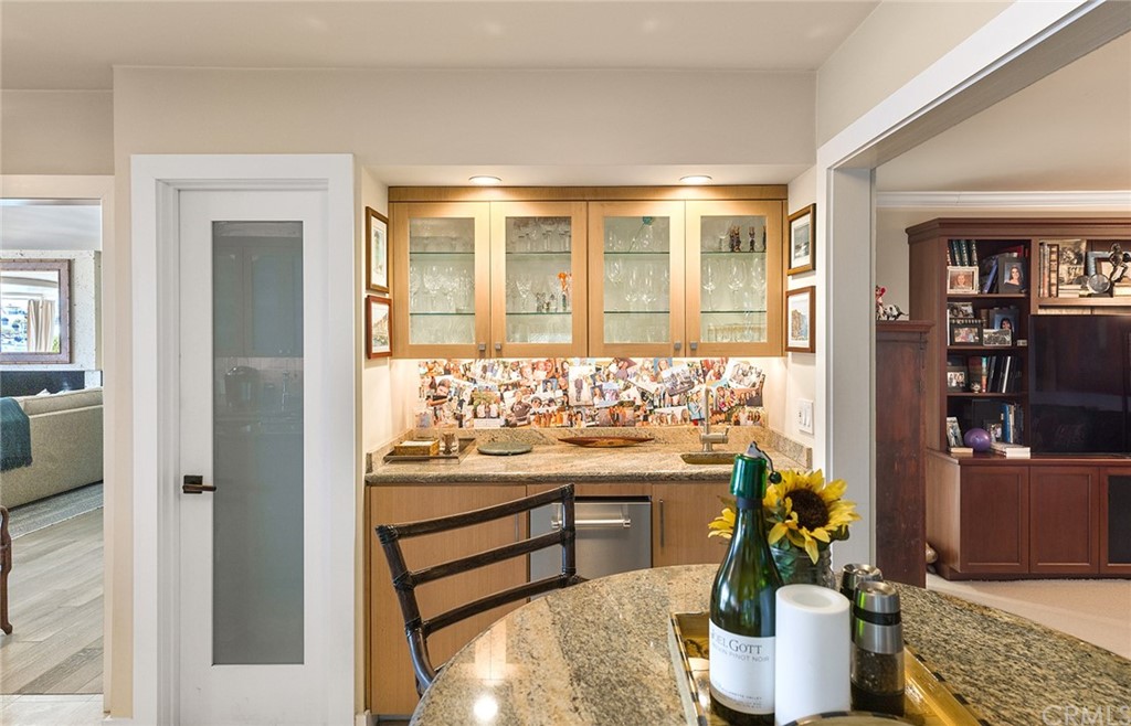 7 Beacon Bay Newport Beach, CA 92660 - Photo 21 of 59 a room with stainless steel appliances kitchen island granite countertop a refrigerator and a stove