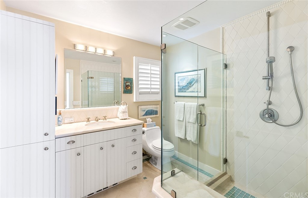 7 Beacon Bay Newport Beach, CA 92660 - Photo 40 of 59 a bathroom with a double vanity sink mirror and double