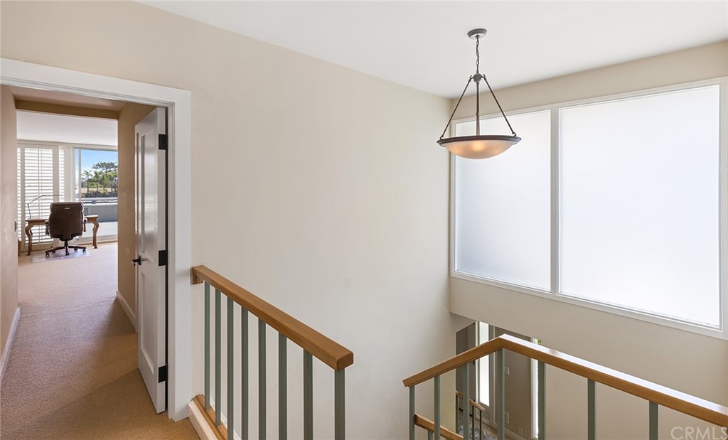 7 Beacon Bay Newport Beach, CA 92660 - Photo 41 of 59 a view of a hallway view with staircase