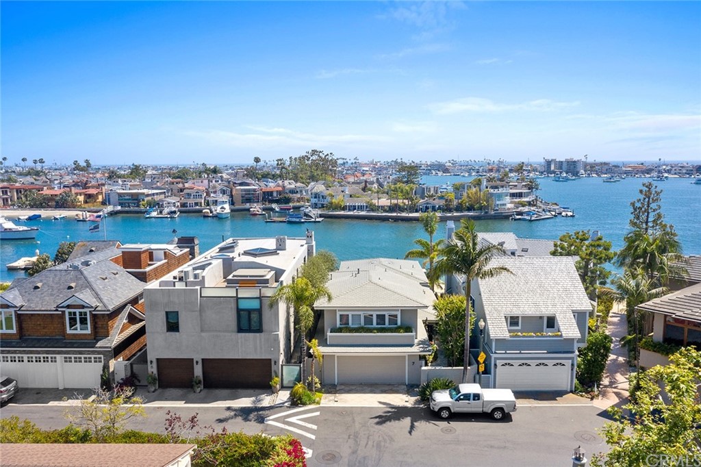 7 Beacon Bay Newport Beach, CA 92660 - Photo 58 of 59 an aerial view of a house with a garden and lake view