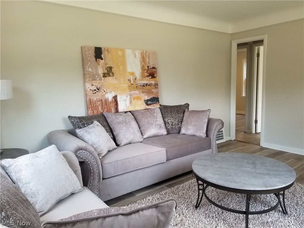 5671 Wellington Road Cleveland, OH 44124 - Photo 2 of 26 Living room featuring hardwood / wood-style floors