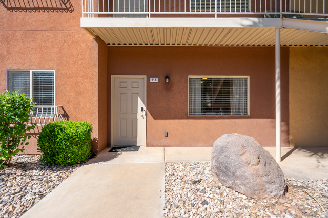 700 North Main Street, Unit F3 Washington, UT 84780 - Photo 1 of 34 Ground-floor entry featuring a panel door with smart lock access