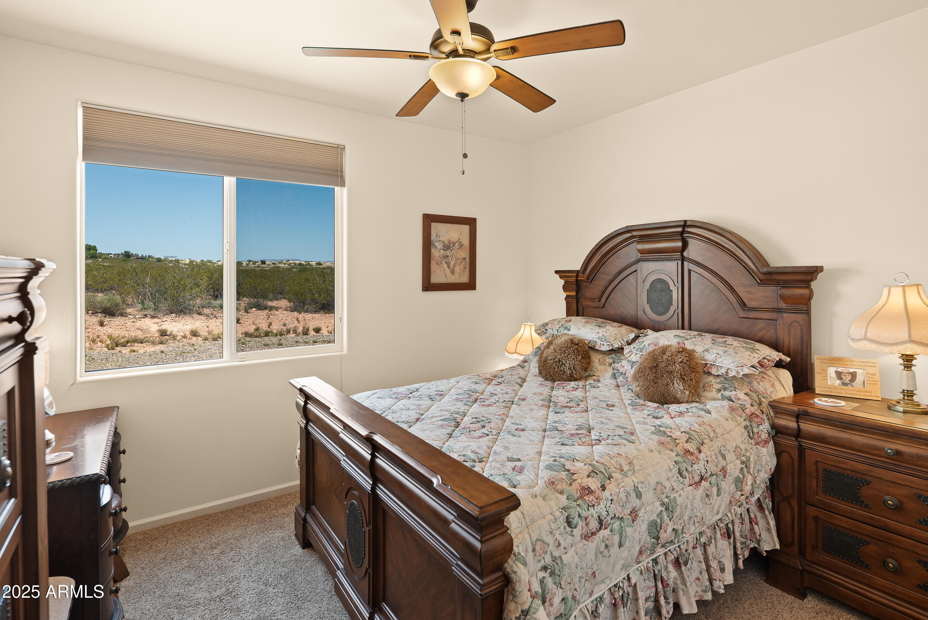 7375 East Sliding Stop Lane Cornville, AZ 86325 - Photo 19 of 53 a bedroom with a bed and a window