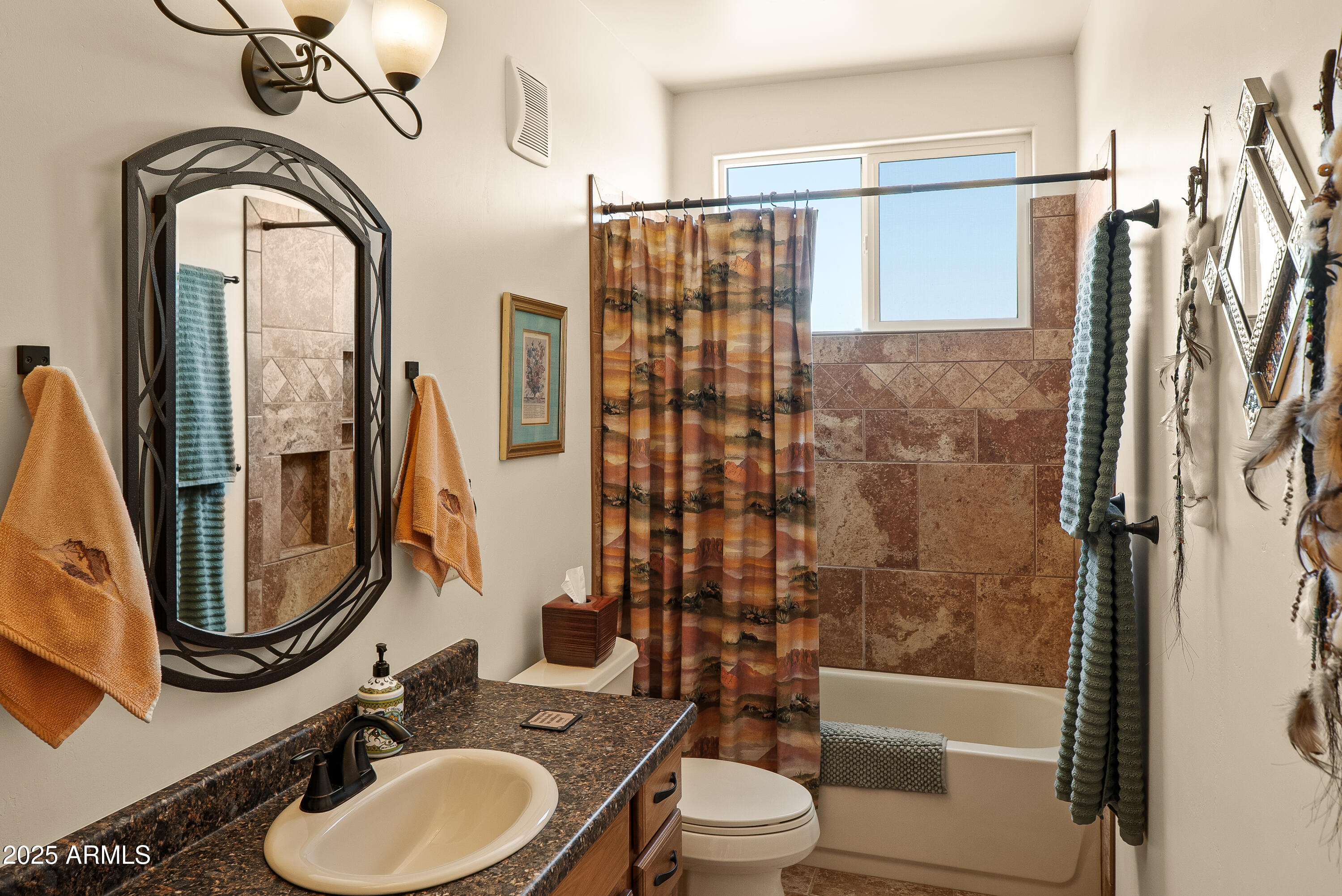 7375 East Sliding Stop Lane Cornville, AZ 86325 - Photo 20 of 53 a bathroom with a sink a toilet and shower