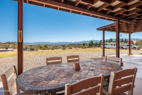 a view of a balcony with an ocean view