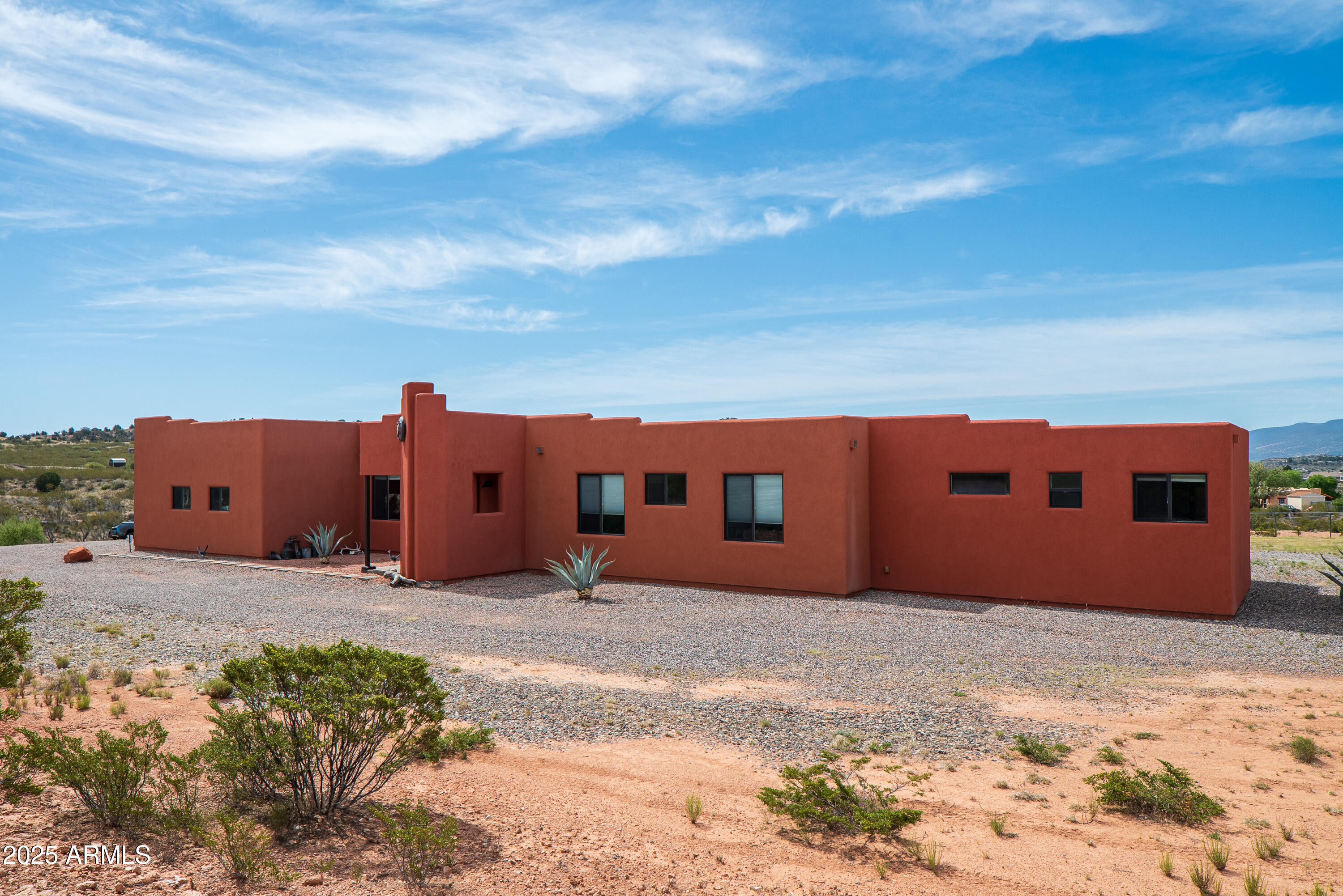 7375 East Sliding Stop Lane Cornville, AZ 86325 - Photo 35 of 53 a front view of a house with a yard