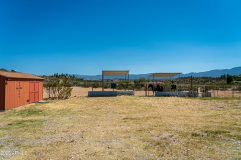 a view of a livingroom with furniture and window