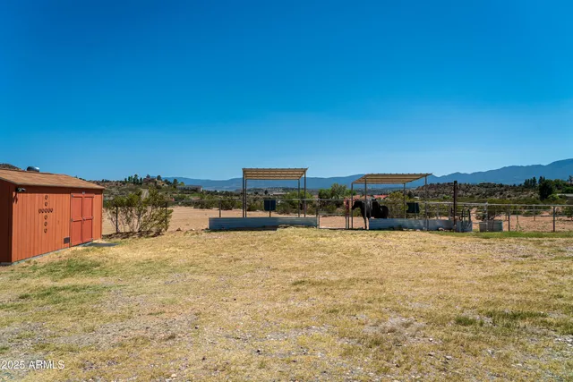 a view of a livingroom with furniture and window
