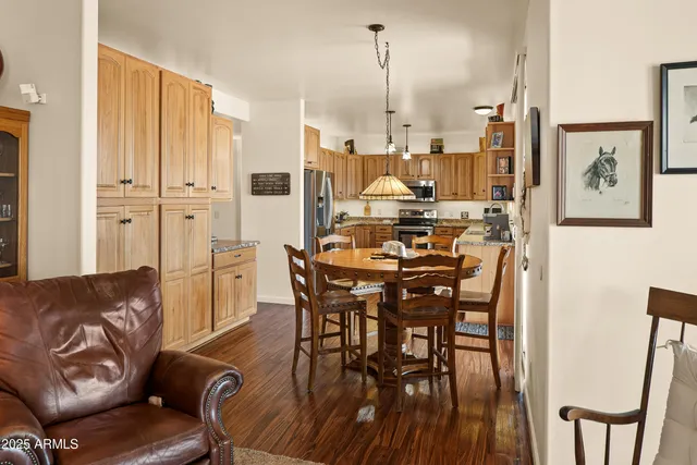 a bedroom with a bed and a mirror