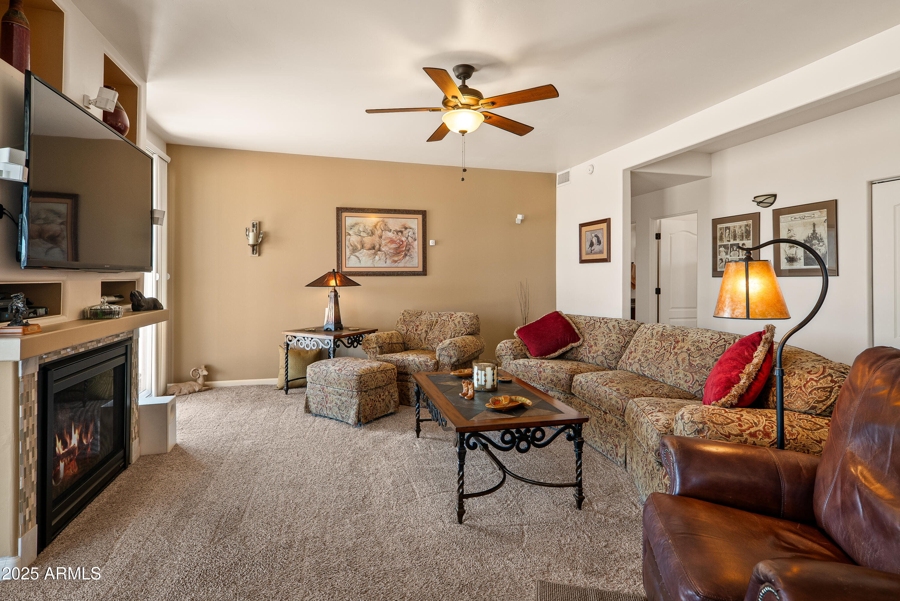 7375 East Sliding Stop Lane Cornville, AZ 86325 - Photo 43 of 53 a living room with furniture and a fireplace