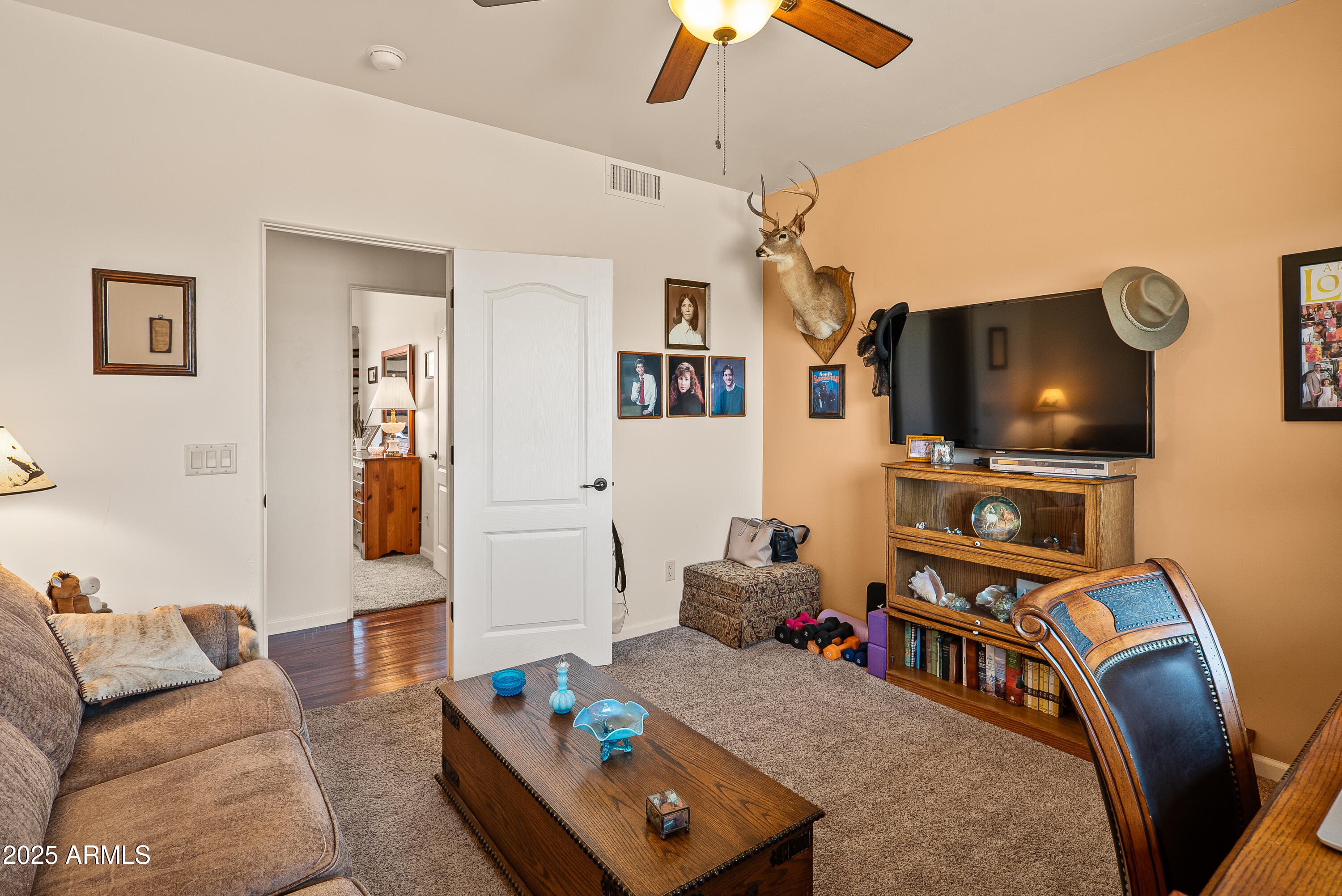 7375 East Sliding Stop Lane Cornville, AZ 86325 - Photo 47 of 53 a living room with furniture and a flat screen tv