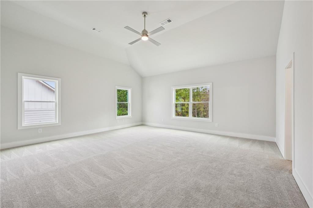 3128 Stonegate Drive Atlanta, GA 30331 - Photo 21 of 35 an empty room with a window and a ceiling fan