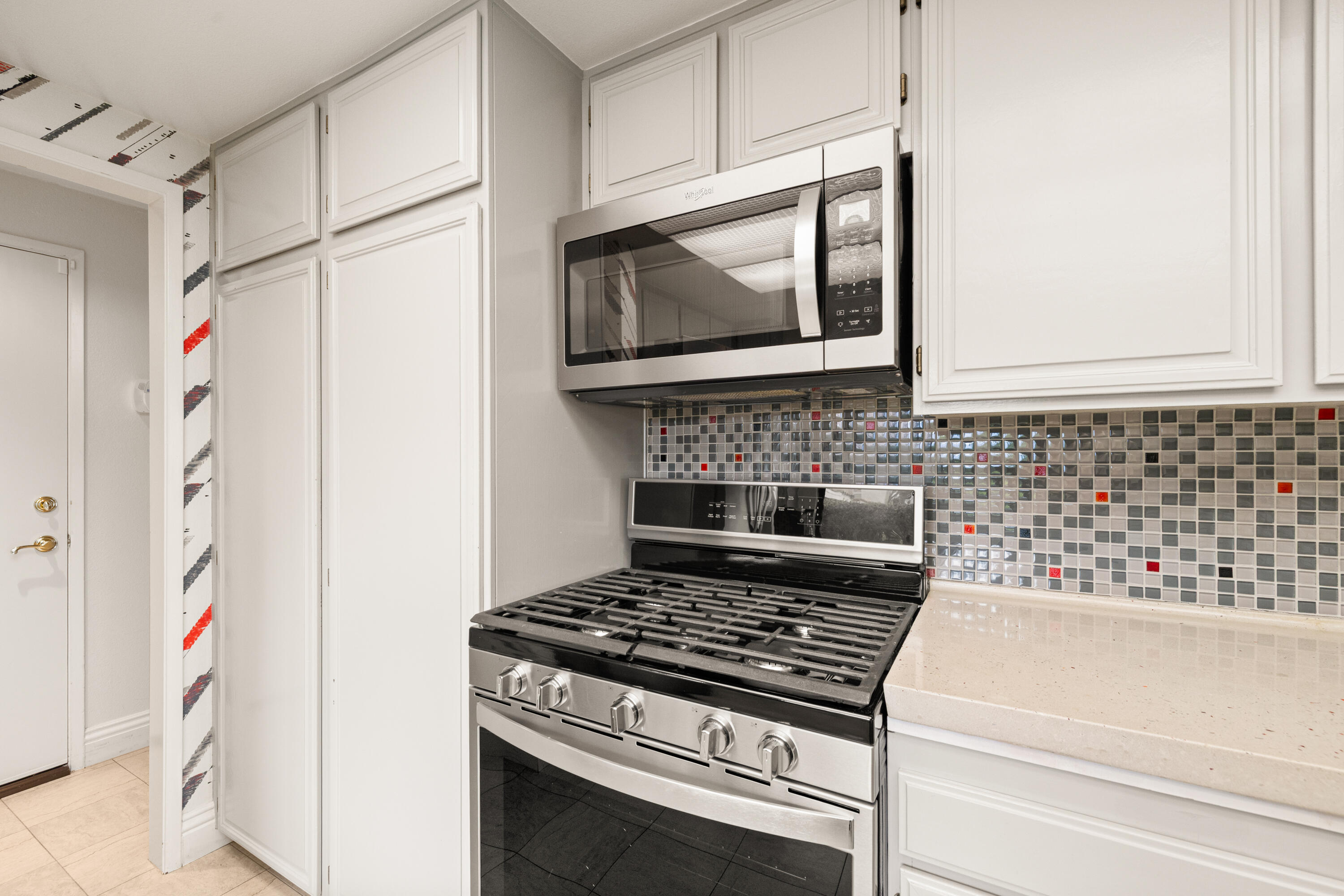 72419 Rodeo Way Rancho Mirage, CA 92270 - Photo 16 of 48 a stove top oven sitting inside of a kitchen