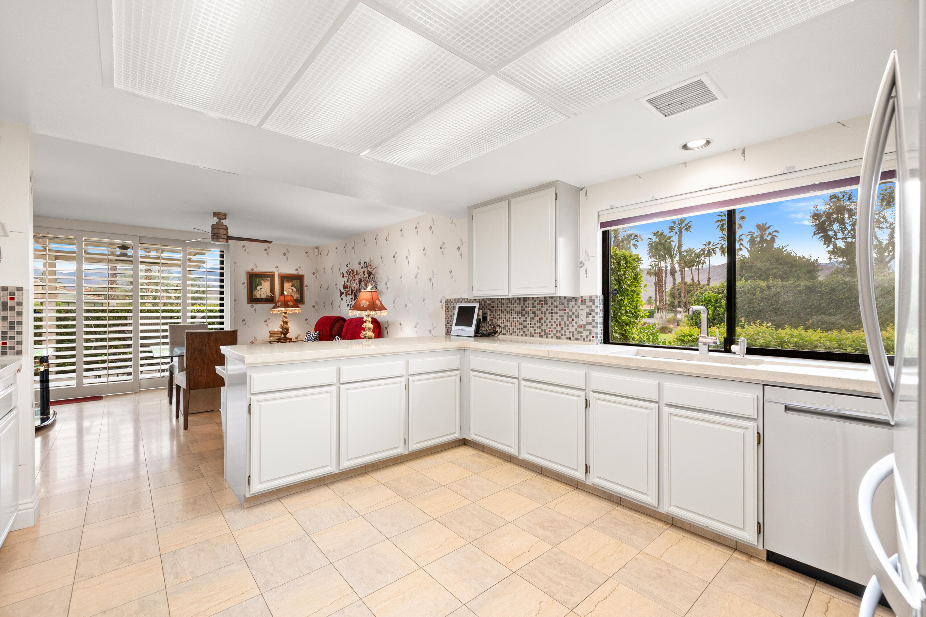 72419 Rodeo Way Rancho Mirage, CA 92270 - Photo 17 of 48 a kitchen with a cabinets and sink