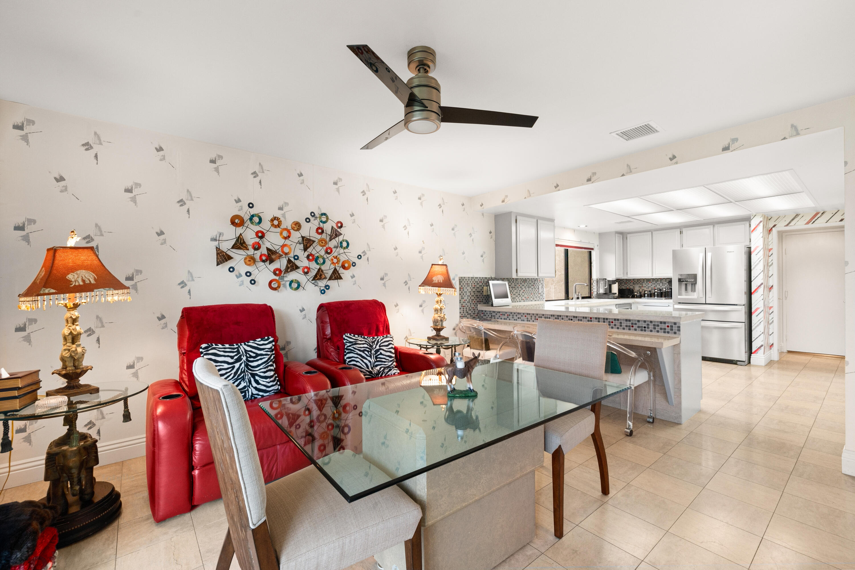 72419 Rodeo Way Rancho Mirage, CA 92270 - Photo 18 of 48 a living room with lots of furniture and kitchen view