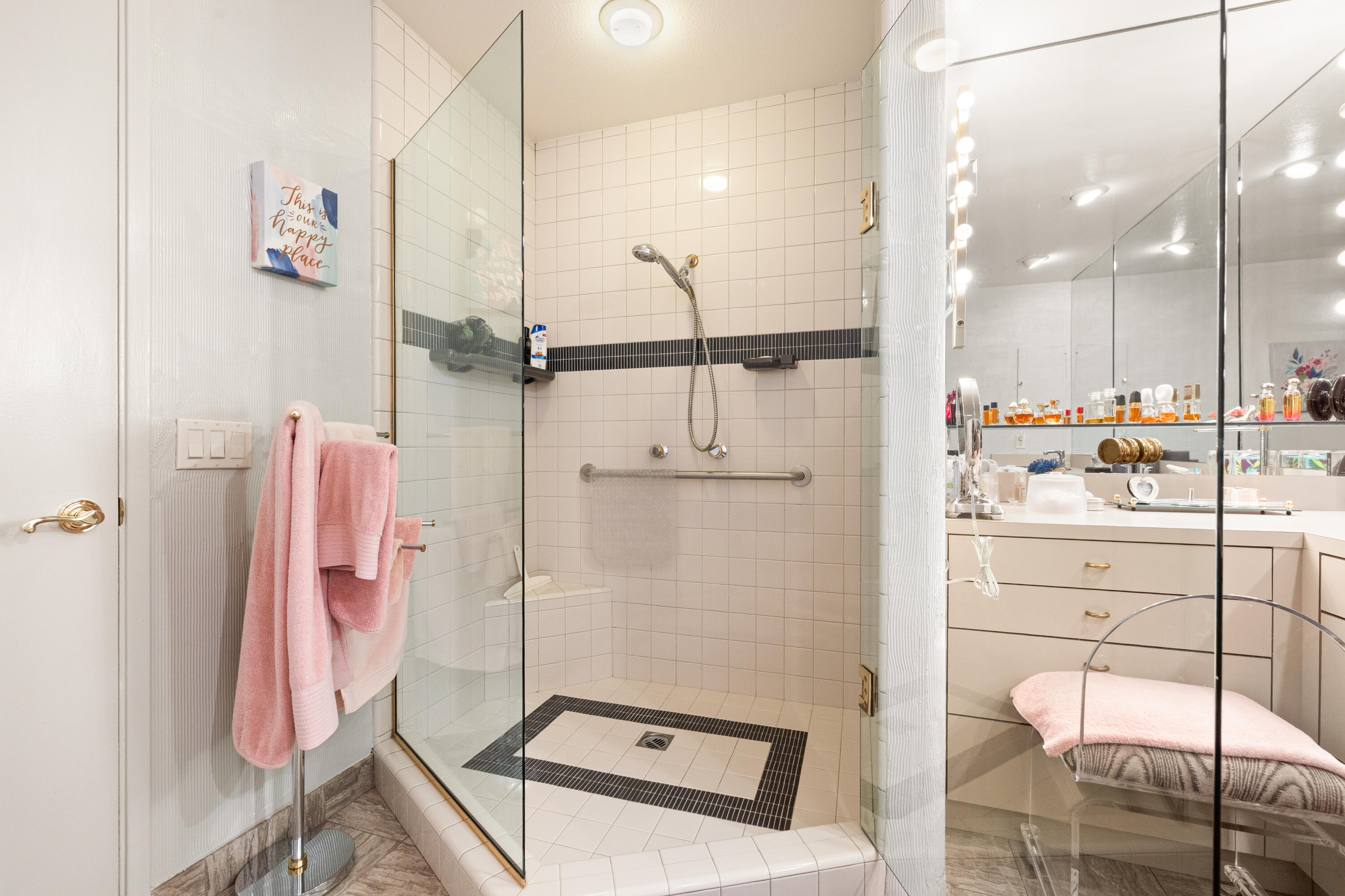 72419 Rodeo Way Rancho Mirage, CA 92270 - Photo 24 of 48 a bathroom with a sink mirror and a shower