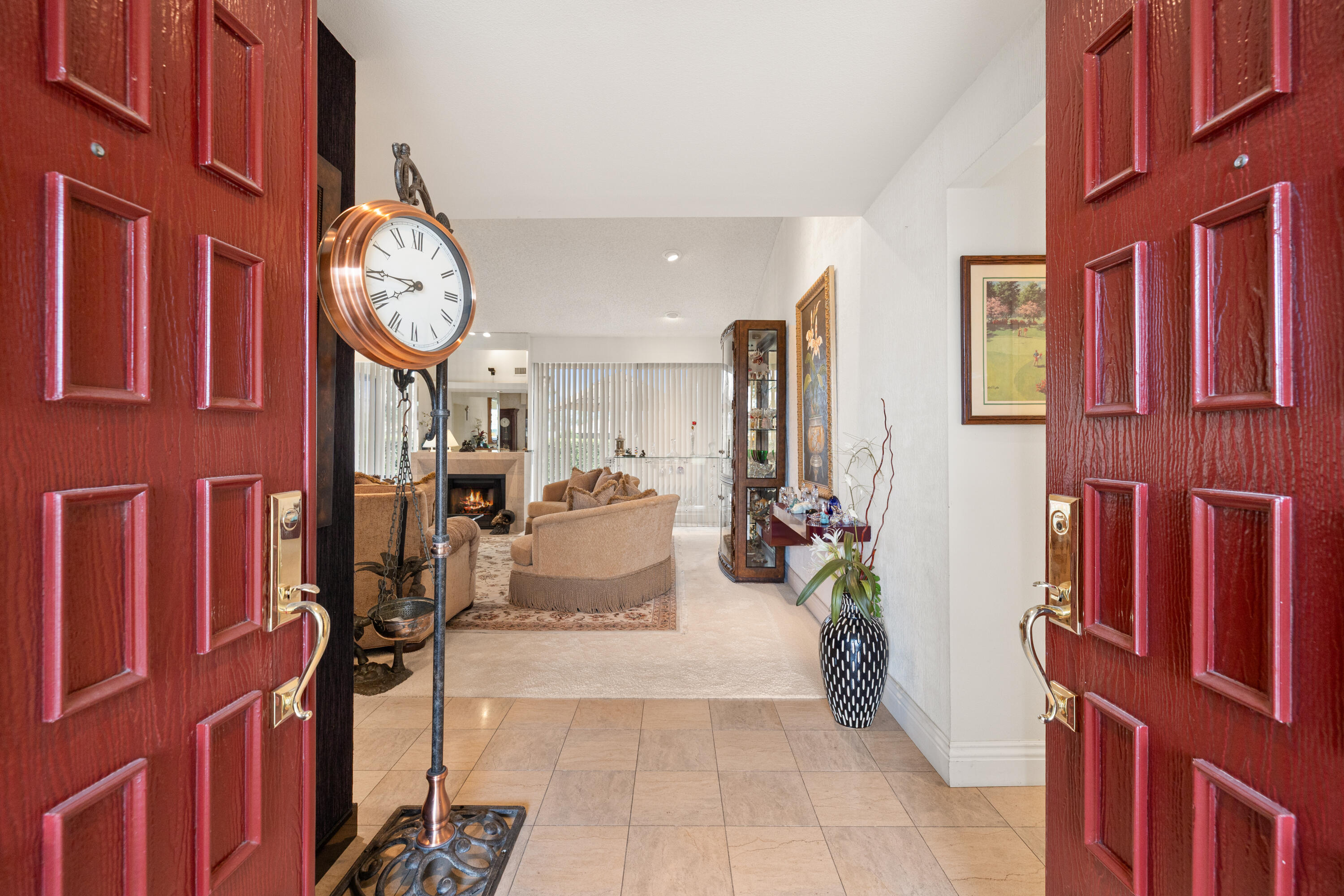 72419 Rodeo Way Rancho Mirage, CA 92270 - Photo 5 of 48 a living room filled with furniture and a clock