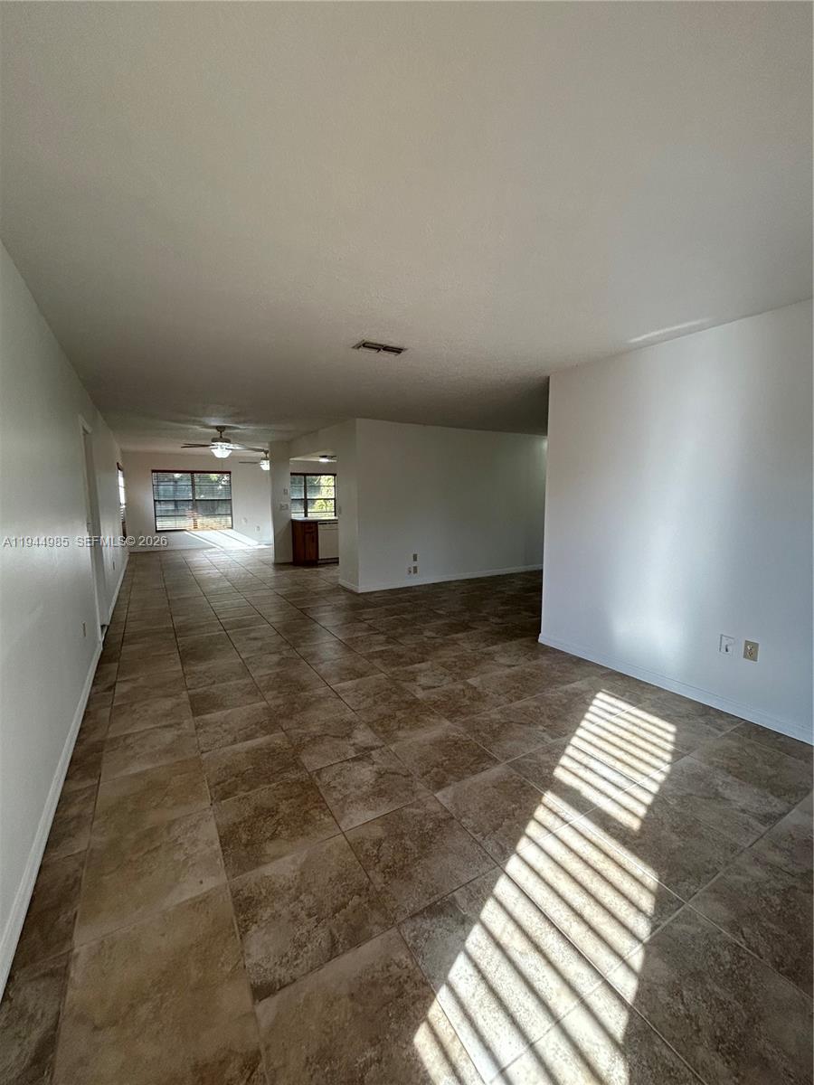 4201 Navarre Avenue, Unit AVE Sebring, FL 33872 - Photo 5 of 22 Open view to Family Room