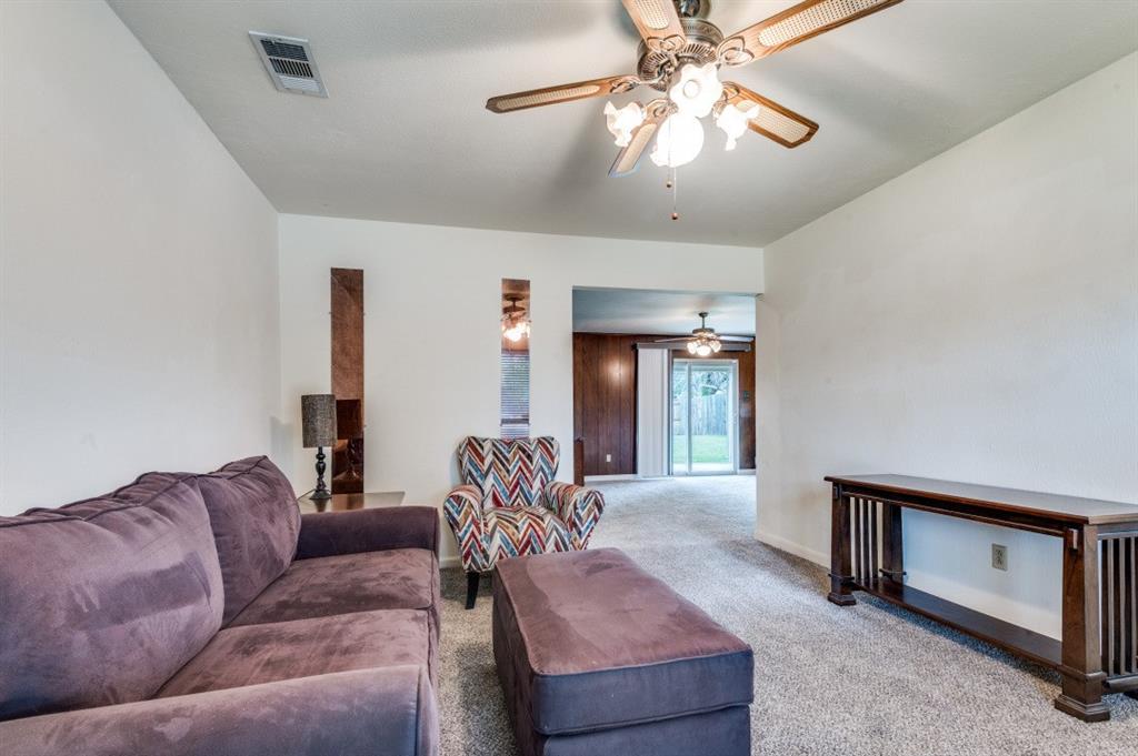 2413 Cheyenne Street Irving, TX 75062 - Photo 4 of 19 a living room with furniture and a window