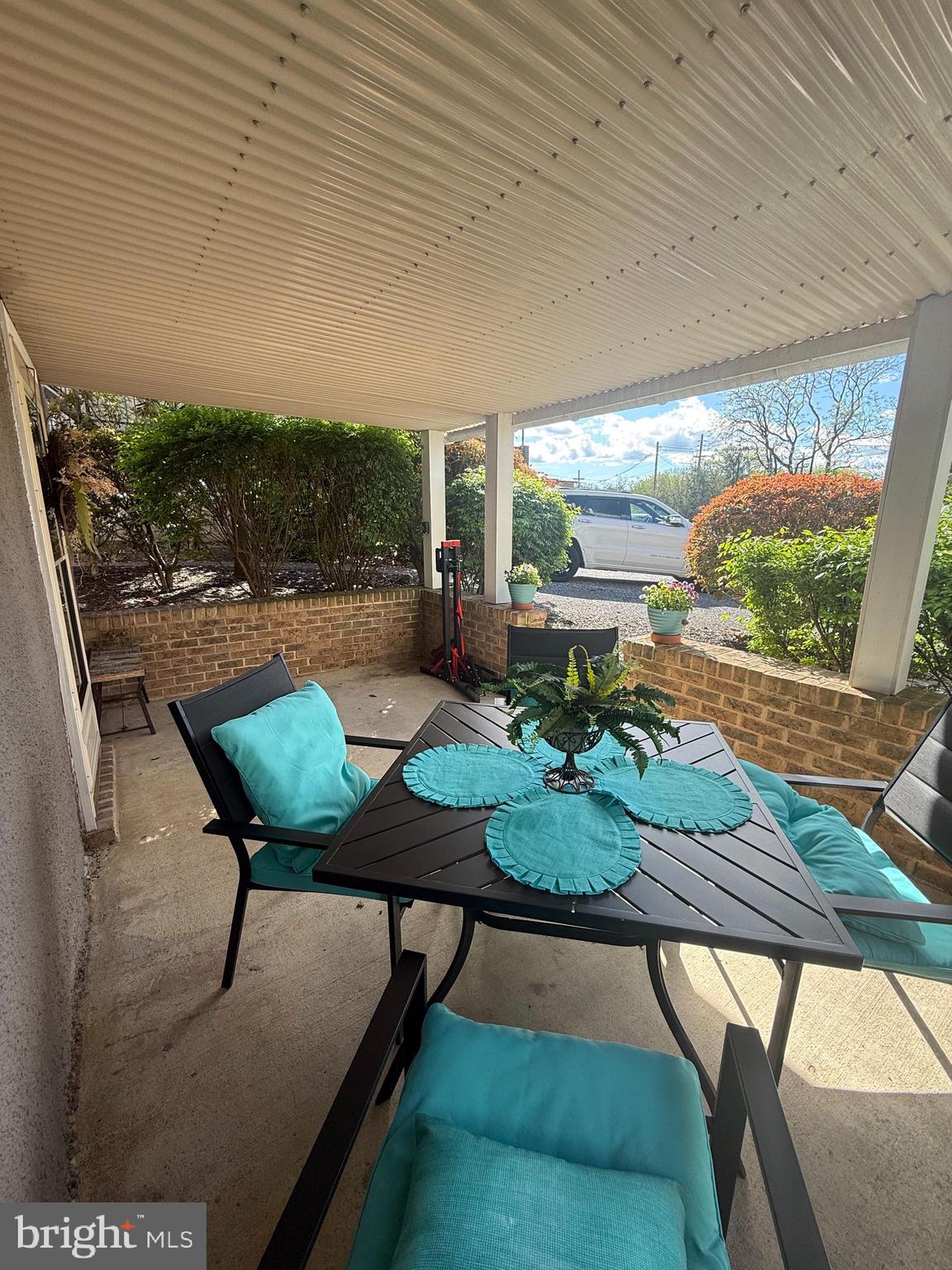 37 South Prospect Street, Unit 101 Hagerstown, MD 21740 - Photo 12 of 51 a backyard of a house with table and chairs
