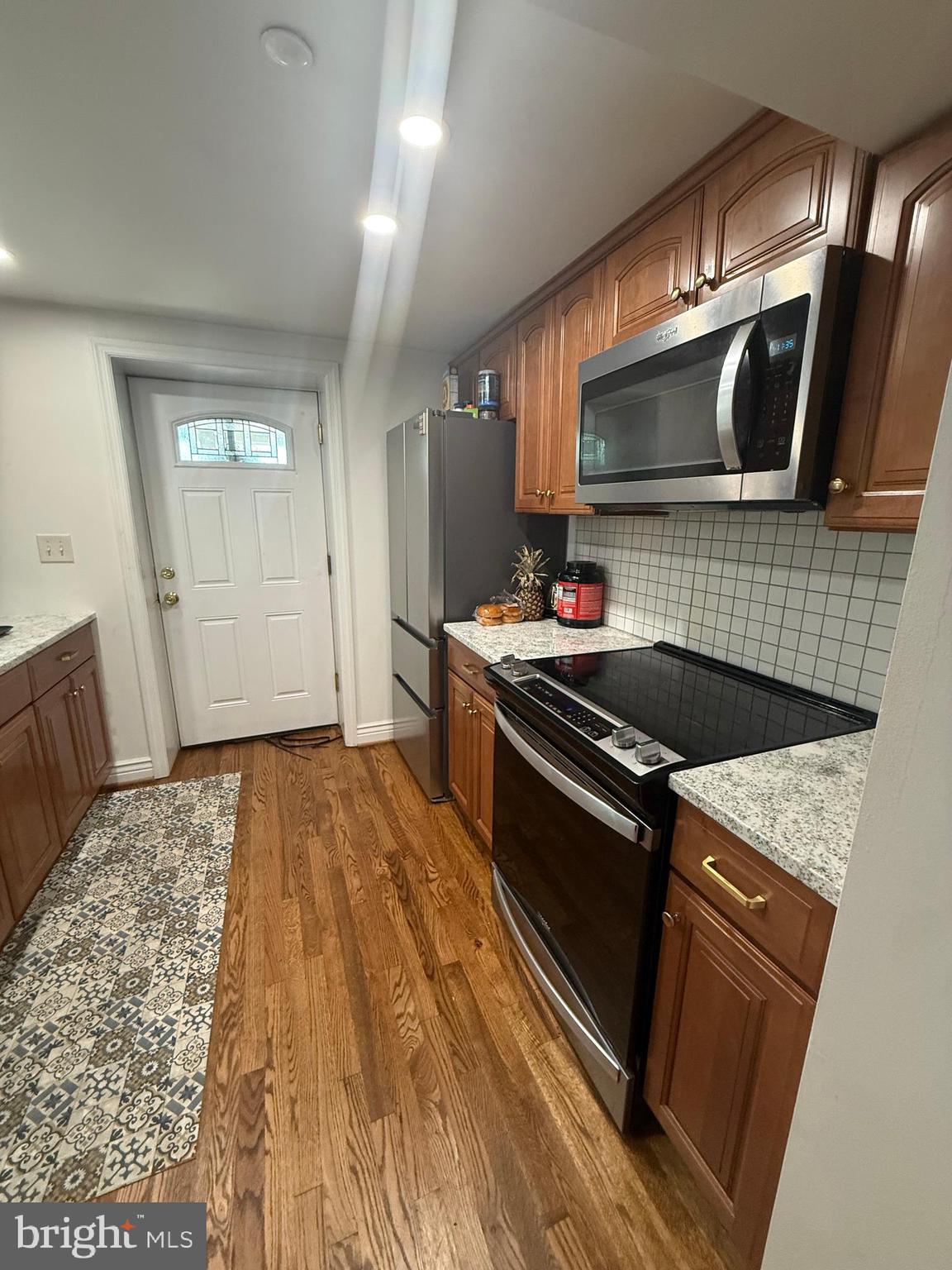 37 South Prospect Street, Unit 101 Hagerstown, MD 21740 - Photo 17 of 51 a kitchen that has a sink and a stove