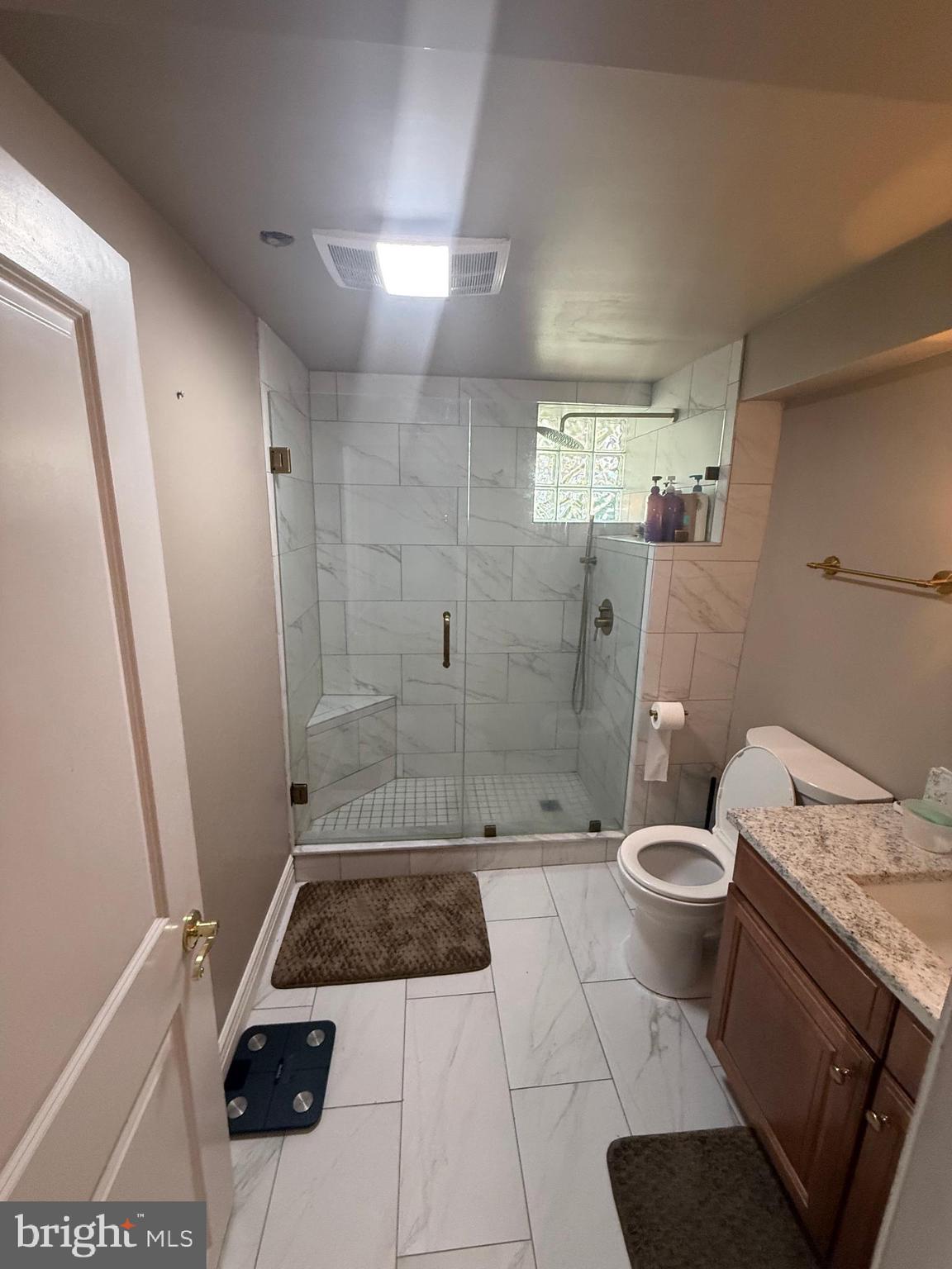 37 South Prospect Street, Unit 101 Hagerstown, MD 21740 - Photo 22 of 51 a bathroom with a sink a toilet and shower