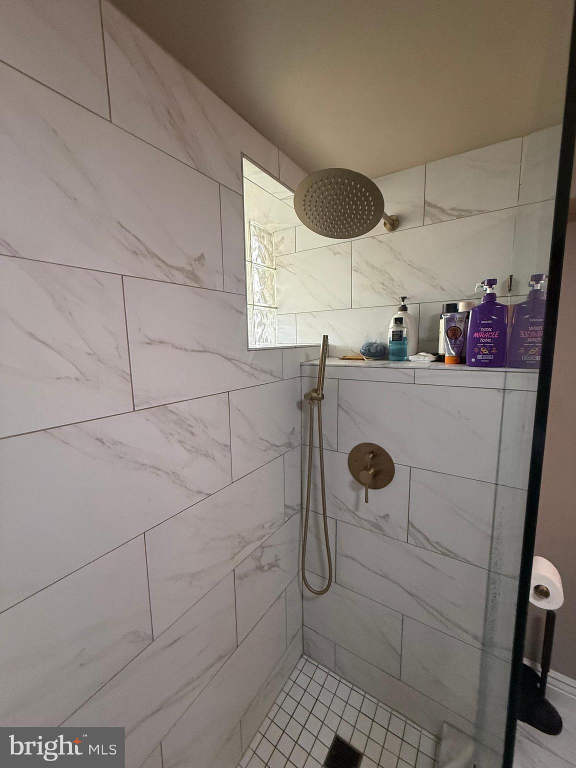 37 South Prospect Street, Unit 101 Hagerstown, MD 21740 - Photo 28 of 51 a bathroom with a sink and a shower