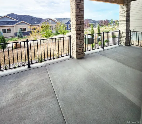 a view of a balcony with city view