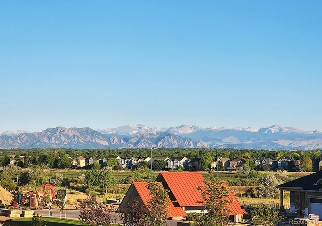 an aerial view of residential building and lake view
