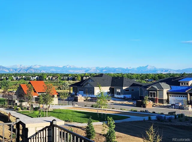 a view of a city from a lake view