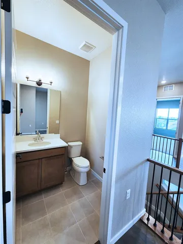 a bathroom with a bathtub and a toilet