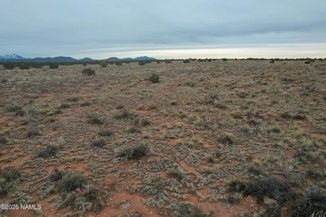 a view of ocean and mountain