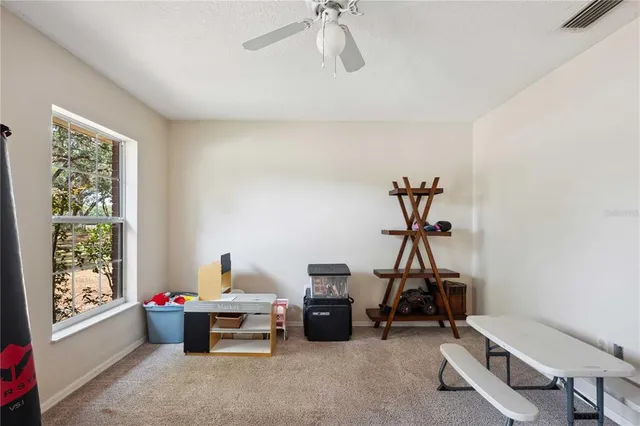 a bathroom with a sink tub double vanity and a mirror