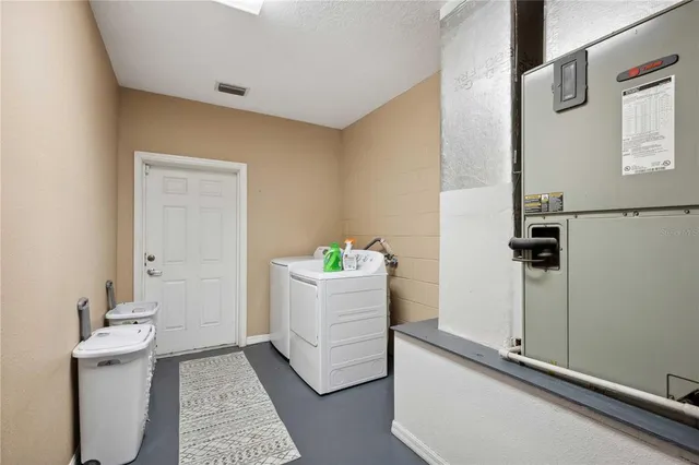 a outdoor space with patio the couches and a dining table with garden view