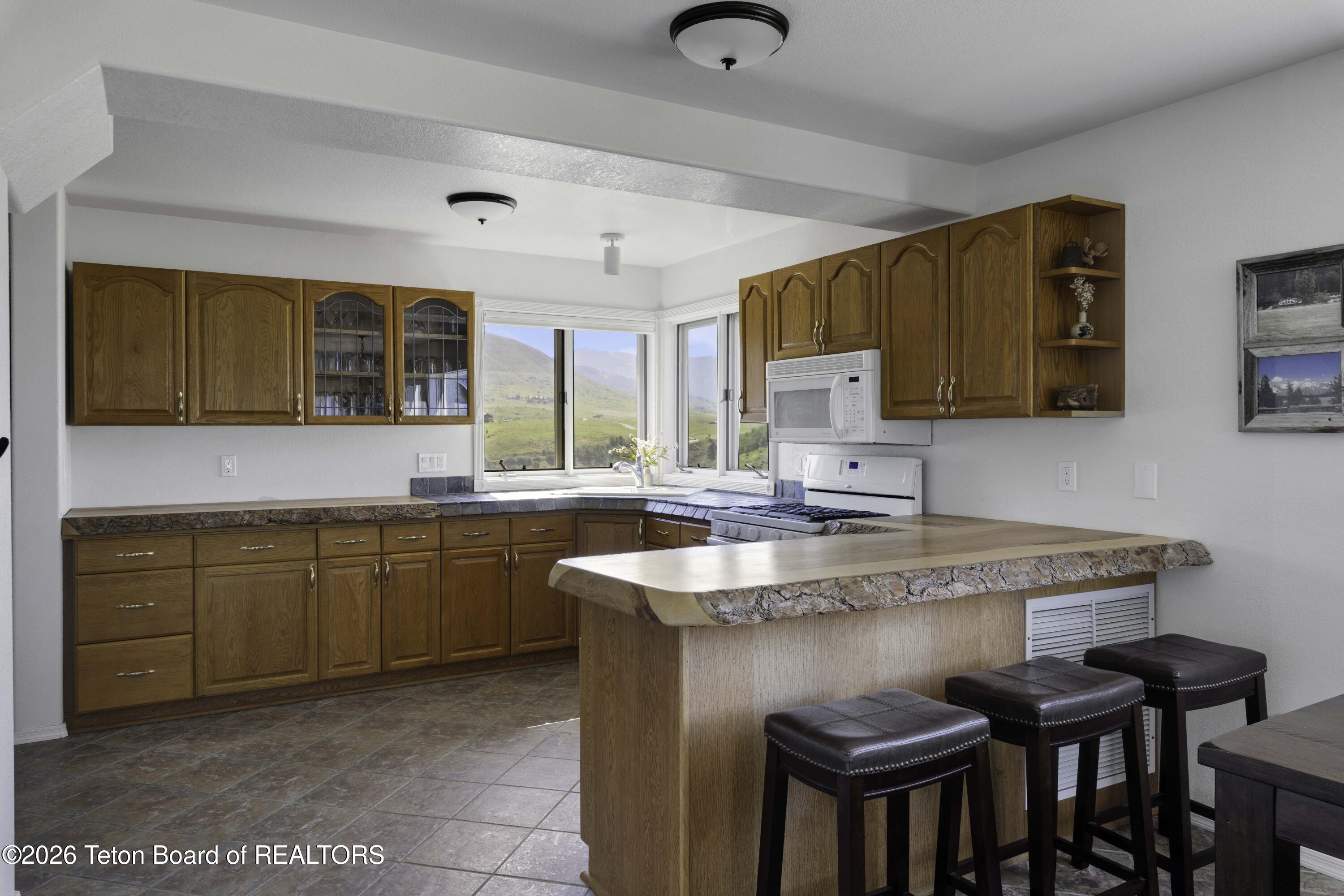 7585 South Squaw Creek Road Jackson, WY 83001 - Photo 7 of 26 Kitchen