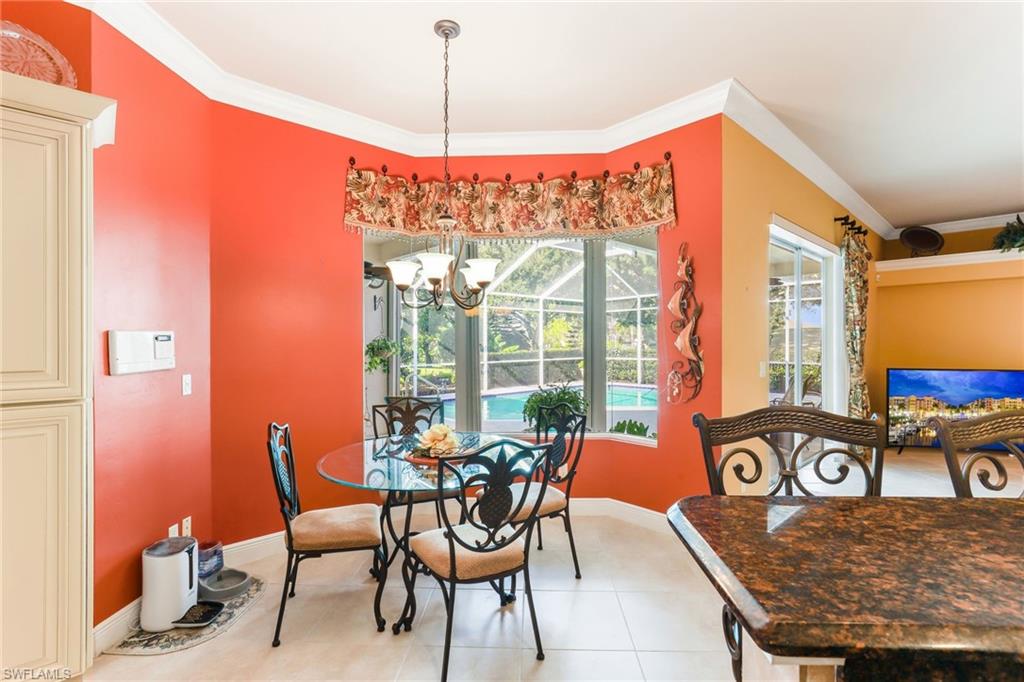 8906 Lely Island Circle Naples, FL 34113 - Photo 16 of 34 a view of a furniture window and outside view