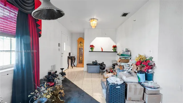 a kitchen with stainless steel appliances a refrigerator and a stove