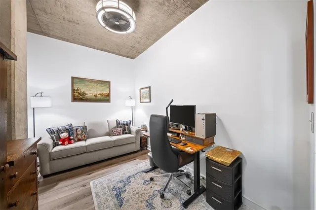 a living room with furniture and a window