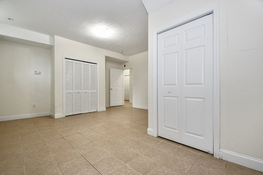32 Providence Street, Unit 5 Worcester, MA 01604 - Photo 14 of 24 an empty room with closet area