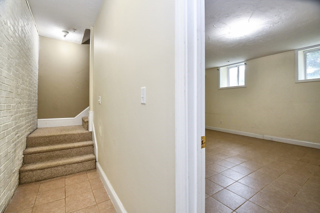 32 Providence Street, Unit 5 Worcester, MA 01604 - Photo 18 of 24 a view of an entryway with staircase