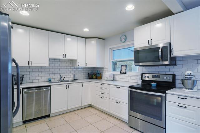 1118 Wooten Road Colorado Springs, CO 80915 - Photo 8 of 25 Gallery Image 8