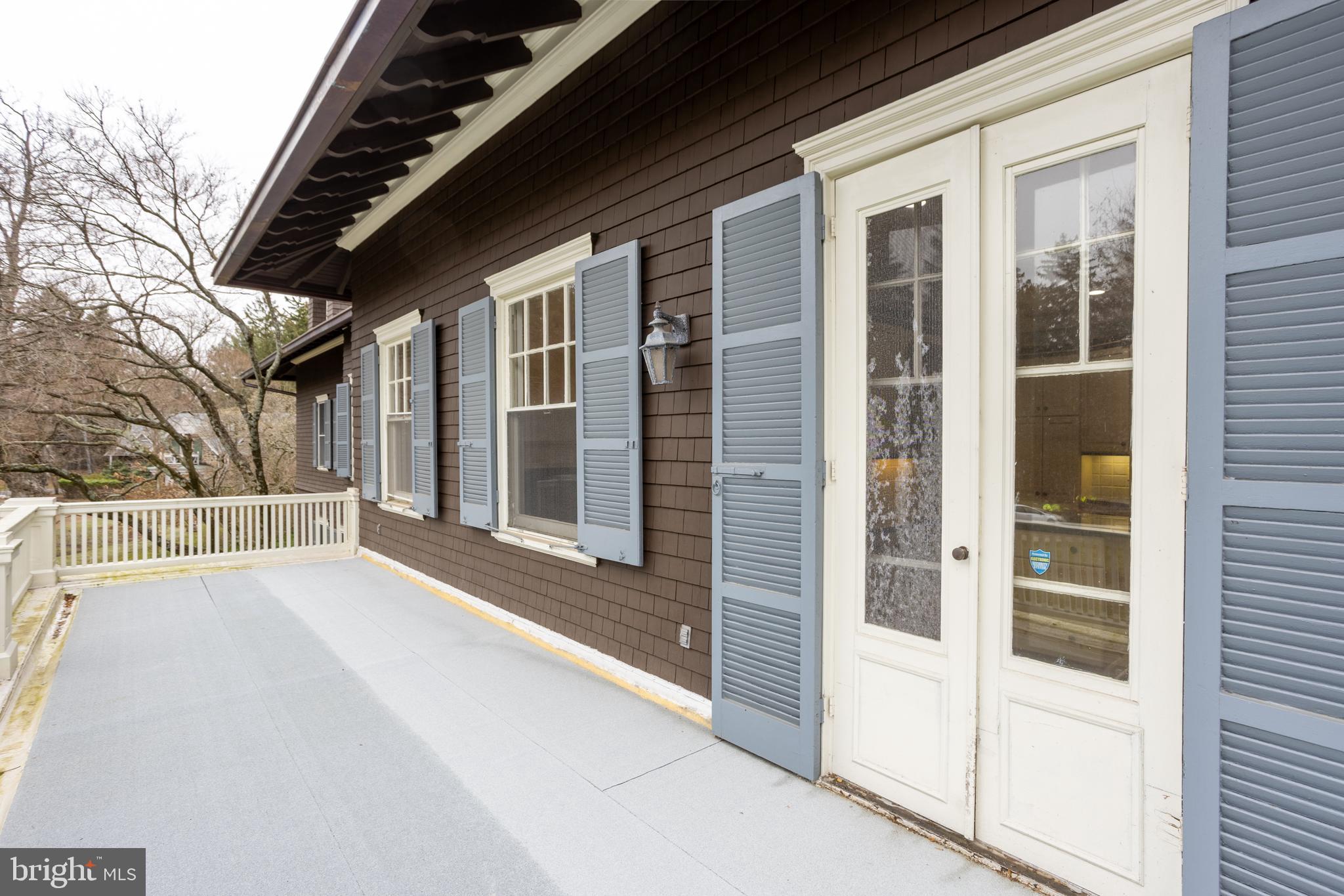 3 Devon Hill Road, Unit D4 Baltimore, MD 21210 - Photo 16 of 46 a view of porch with a door and wooden floor