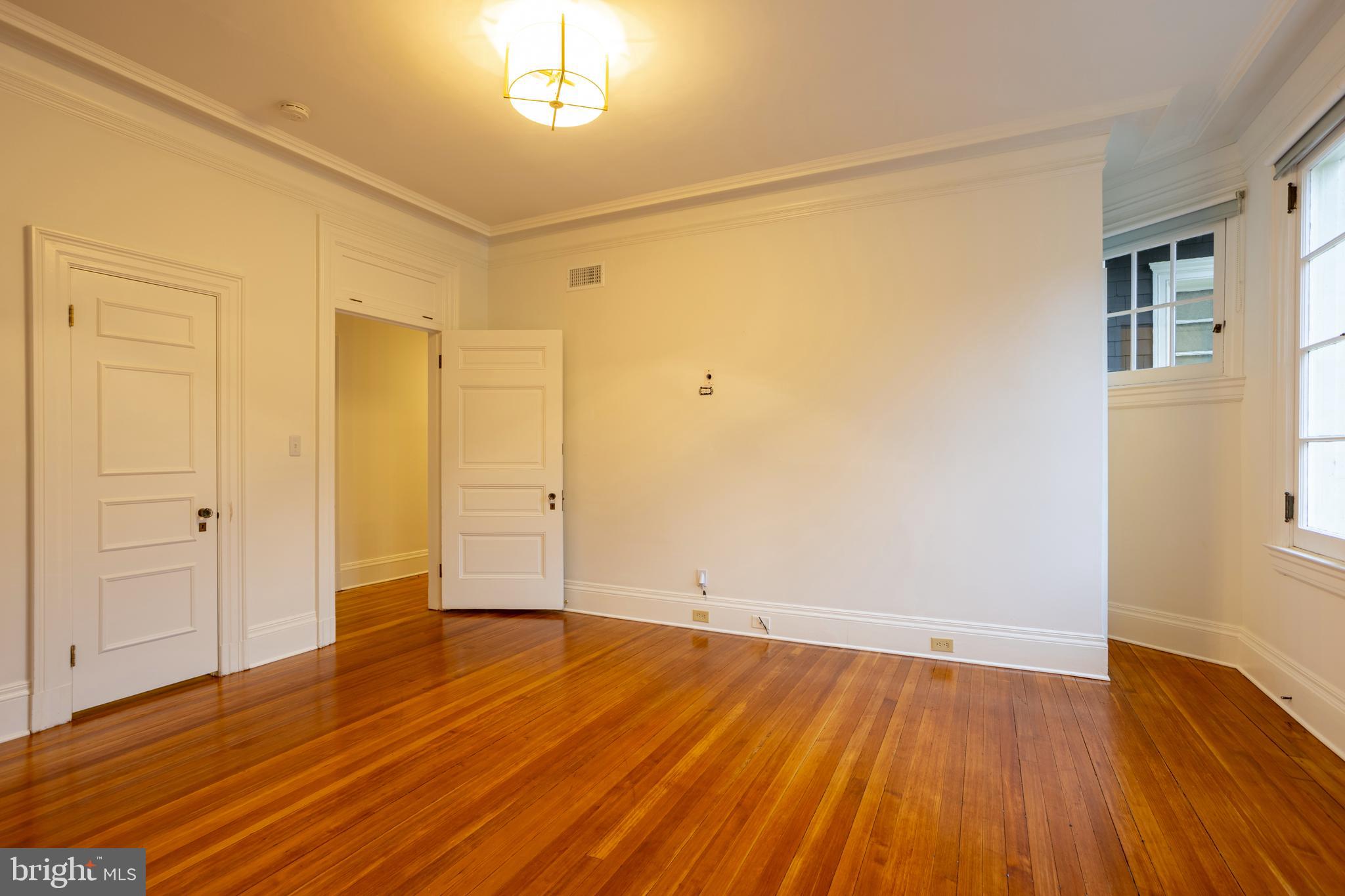 3 Devon Hill Road, Unit D4 Baltimore, MD 21210 - Photo 21 of 46 wooden floor in an empty room