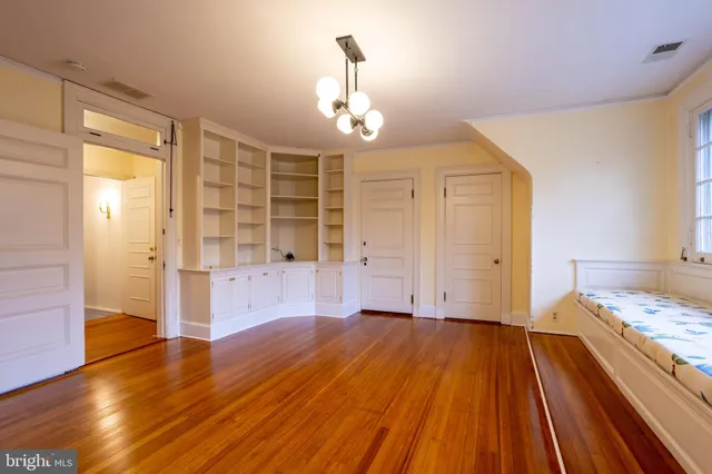 a view of a livingroom with wooden floor