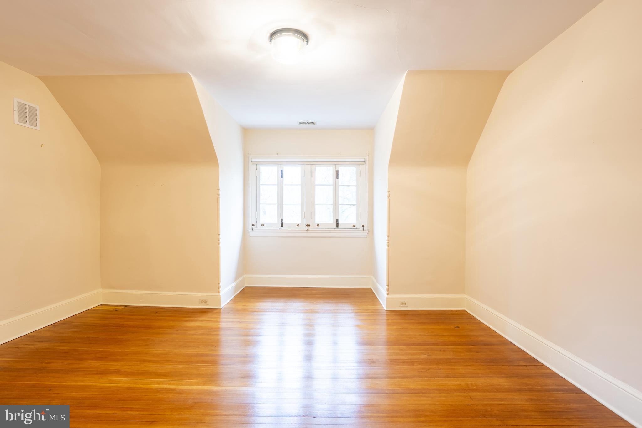 3 Devon Hill Road, Unit D4 Baltimore, MD 21210 - Photo 43 of 46 a view of an empty room with wooden floor