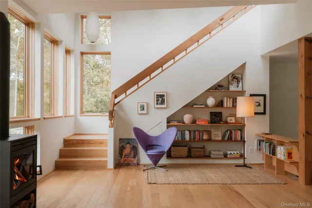 a view of a dining room with furniture and window