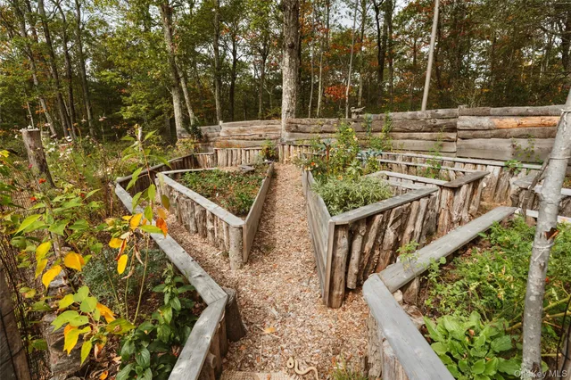 a kitchen with sink refrigerator and window