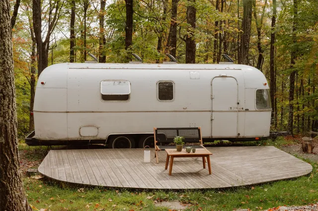 a bathroom with a sink and a large window