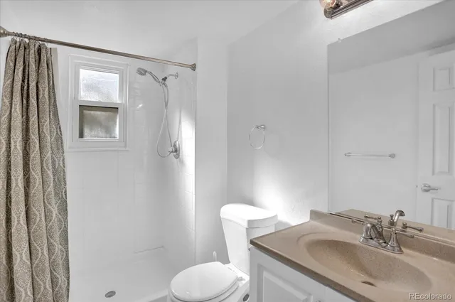 an empty room with a empty space and windows